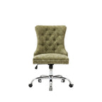Green office chair with chrome base in a room with a desk and decor.