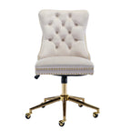 Beige office chair with gold accents on a white background